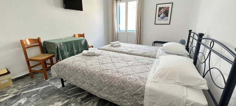 Chambre double avec lits simples